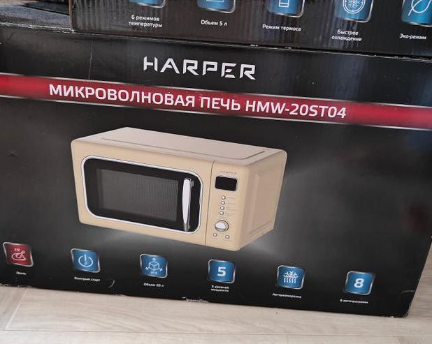 Могу и пиццу разогреть, и круассан испечь: обзор СВЧ с грилем Harper HMW